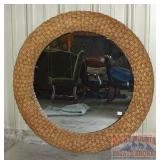 Massive 50" Round Beveled Rattan Mirror.