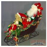 Santa & Elves in Sleigh.