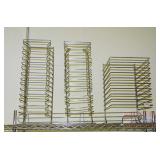 3 Assorted Pizza Pan Racks. 3 Assorted Pizza Pan Racks.