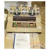 Taber 5150 Abraser w/ Owner's Manual.