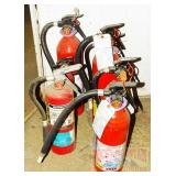 7 Assorted Fire Extinguishers.