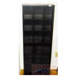 Black Adjustable CD/DVD Shelf. Black Adjustable CD/DVD Shelf.