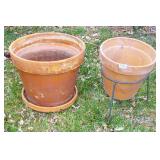 Large Terra Cotta Pot & Pot w/ Iron Stand. Large Terra Cotta Pot & Pot w/ Iron Stand.