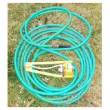 Garden Hose & Sprinkler.