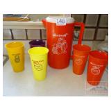 Plastic Pitcher and Cups.