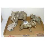 4 Porcelain Elephant Figurines. 4 Porcelain Elephant Figurines.