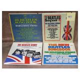 4 Assorted Beatles Records.