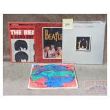 4 Assorted Beatles Records.