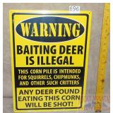 "Baiting Deer" Tin Sign. 17X12.