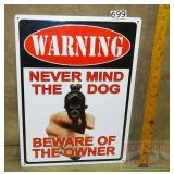 "Never Mind the Dog" Tin Sign. 17X12.