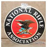 "NRA" 11" Round Embossed Tin Sign.