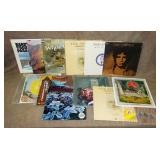 12 Assorted Record Albums.