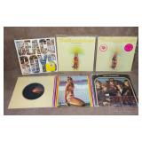 6  Assorted Beach Boys LPs.