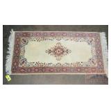 Hand Knotted Pastel Wool Rug.