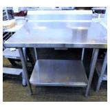SS WORK TABLE/30X36/W/6" LIP ON BACK