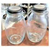GLASS PITCHERS W/LIDS (2)