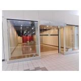 Glass store façade w/roll up door, 324 x 209