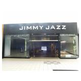 Glass store façade w/roll up door, 396 x 167