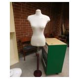 Female mannequin on stand