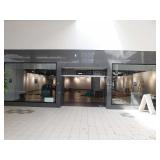 Glass store façade w/roll up door, 495x144