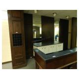 Wall with mirrors and clothes hanging rods