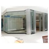 Store façade with 2 roll up doors, 56 ft x 12 ft