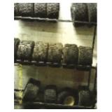 1 METAL TIRE RACK W/ ALL TIRES (ABOUT 20 USED)