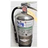 K Fire Extinguisher In the Green