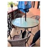 Patio table, 4 chairs, umbrella