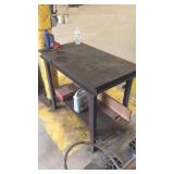 Steel work   table approximately 2