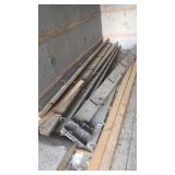 Wall racks for storing hoses and cords