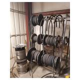 Large quantity of new hydraulic hose with rack