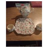 Royal Winton floral teapot, plate, creamer, and Royal Winton floral teapot, plate, creamer, and