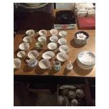 15 saucers, 10 teacups, 8 sugar bowls, and 3 15 saucers, 10 teacups, 8 sugar bowls, and 3