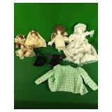 Dolls, stuffed bears, and crocheted baby clothes Dolls, stuffed bears, and crocheted baby clothes