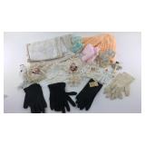 Box w/ table linens, knitted booties, Gloves etc. Box w/ table linens, knitted booties, Gloves etc.