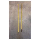 Two Yellow Metal Rods with Hooks