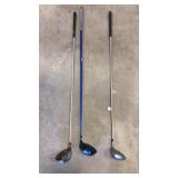 Three golf clubs Three golf clubs