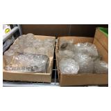 Four boxes of clear glass