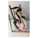 Porcelain Doll With Rocking Chair