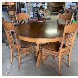 48" Round Oak Table w/ 4 Oak Spindle Back Chairs