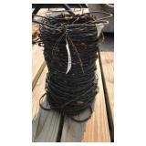 Partial Roll of Barb Wire