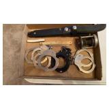 Handcuffs, Knife, Fishing Reel