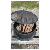 Firepit With 3 Bundles Of Wood