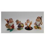 Four Ceramic Grumpy Figurines