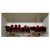 Shelf Of Red Glass (Cups, Vases, Cruets, Etc)