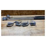 4 Golf Clubs and Extra Golf Heads