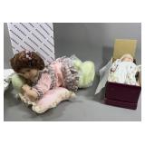 Porcelain Dolls in boxes
