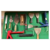 Assortment of Concrete tools and Caulk Guns