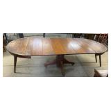 Oak Extension Dining Table featuring a carved